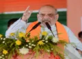 Union Home Minister Amit Shah addresses the public meeting in support of the BJP candidate Saurav Sikar from the Dum Dum Uttar Assembly constituency, in Kolkata (ANI Photo)