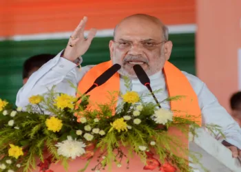 Union Home Minister Amit Shah addresses the public meeting in support of the BJP candidate Saurav Sikar from the Dum Dum Uttar Assembly constituency, in Kolkata (ANI Photo)