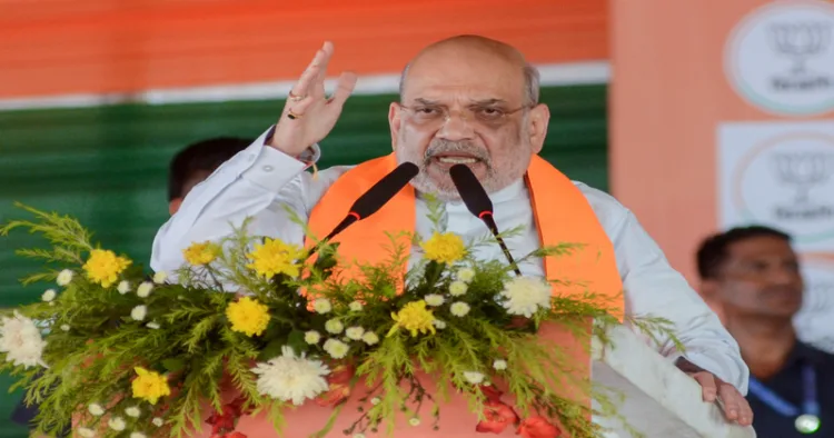 Union Home Minister Amit Shah addresses the public meeting in support of the BJP candidate Saurav Sikar from the Dum Dum Uttar Assembly constituency, in Kolkata (ANI Photo)