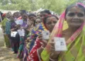 Purba Medinipur [West Bengal], Apr 23 (ANI): Voters show their voting cards while waiting in line to cast their votes during the first phase of the West Bengal Assembly elections 2026 at a polling station, in Purba Medinipur on Thursday. (ANI Photo used for representative purposes)