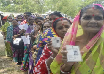 Purba Medinipur [West Bengal], Apr 23 (ANI): Voters show their voting cards while waiting in line to cast their votes during the first phase of the West Bengal Assembly elections 2026 at a polling station, in Purba Medinipur on Thursday. (ANI Photo used for representative purposes)