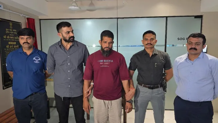 Gym trainer after being arrested by Surat Police