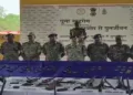 Security forces recover weapons (Image Credit: ANI)