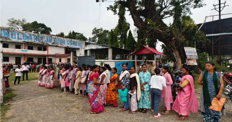 Voters standing in a queue to cast their votes in West Bengal elections 2026