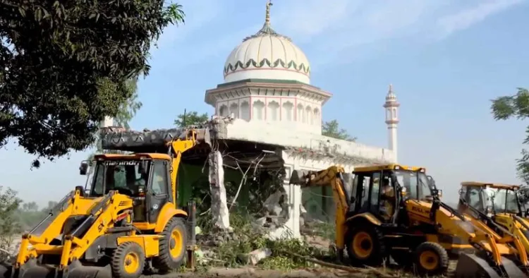 Illegal Mazar built on irrigation department’s land bulldozed by administration
