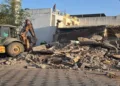 Local administration bulldozes illegal farmhouse of Congress leader Altaf Khafi in Jamnagar