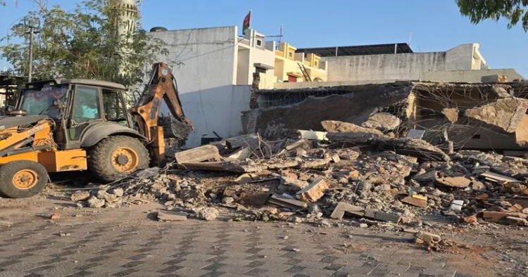 Local administration bulldozes illegal farmhouse of Congress leader Altaf Khafi in Jamnagar