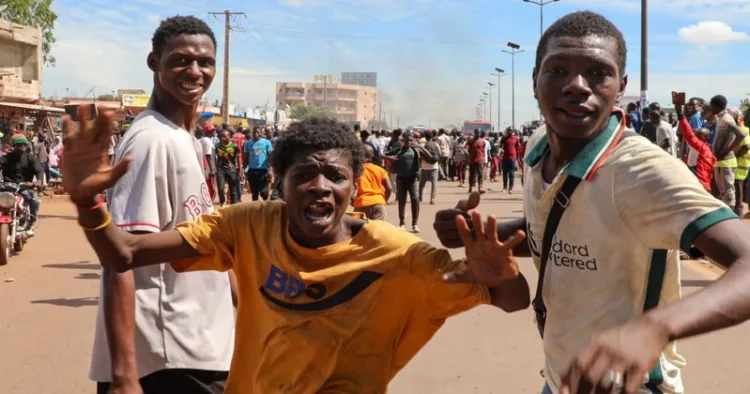 Smoke and gunfire engulf Bamako as coordinated attacks targeting military bases linked to the Wagner Group trigger panic, with the al-Qaeda-linked Jamaat Nusrat al-Islam wal-Muslimeen suspected behind the assault.