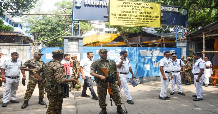 Kolkata, May 03 (ANI): Central paramilitary forces and Kolkata Police maintain tight security outside the strong room (ballot box preservation room) and counting centre of Bhabanipur Assembly constituency at Shekhwat School ahead of vote counting for the West Bengal Legislative Assembly elections 2026, in Kolkata on Sunday. (ANI Photo)