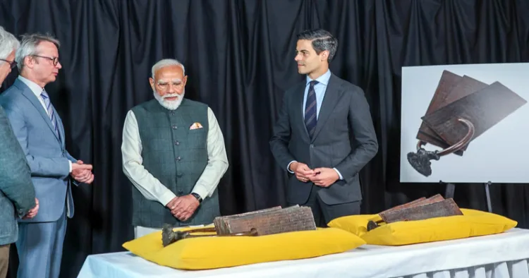 The Hague [Netherlands], May 16 (ANI): Prime Minister Narendra Modi and Prime Minister of the Netherlands Rob Jetten during the repatriation ceremony of the 11th-century Chola Copper Plates being returned to India from the Netherlands, in The Hague on Saturday. (@narendramodi X/ANI Photo)