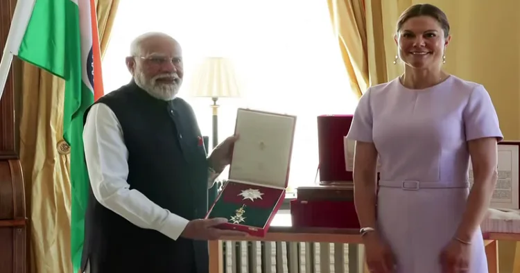 Gothenburg [Sweden], May 17 (ANI): Prime Minister Narendra Modi being conferred with Sweden's Royal Order of Polar Star, the highest honour awarded to a Head of Government by the Scandinavian nation, in Gothenburg on Sunday. (DD/ANI Video Grab)