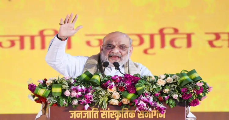 New Delhi, May 24 (ANI): Union Home Minister Amit Shah speaks during Janjatiya Sanskriti Samagam, at Red Fort, in New Delhi on Sunday. (ANI Photo/Naveen Sharma)