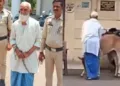 Accused Hamiduddin (70) in police custody after being arrested in Raipur for alleged objectionable acts with a cow, following outrage over a viral video