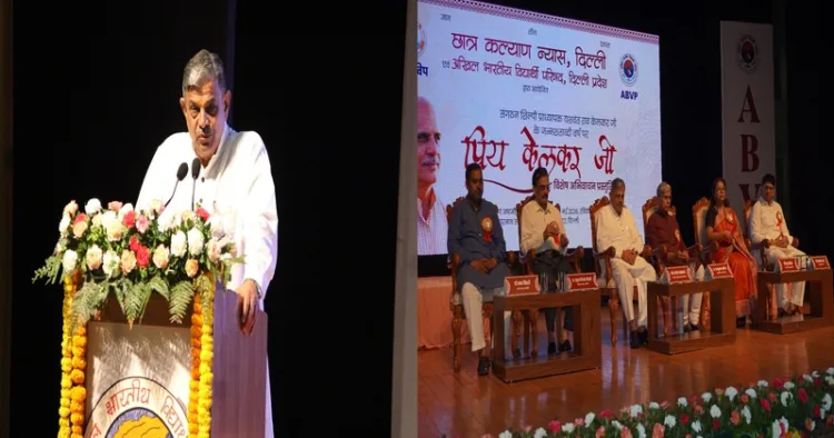 (Left) RSS Sarkaryavah Shri Dattatreya Hosabale Ji (Right) Dignitaries on the stage on the occasion of grand special commemorative programme titled ‘Priya Kelkar Ji’