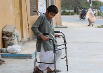A boy inflicted by polio