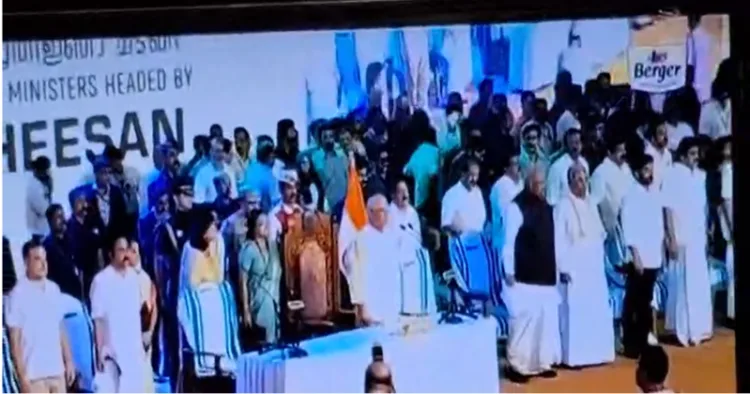 CPI (M) and Congress leaders stand up for Vande Mataram during the swearing-in of the Keralam CM