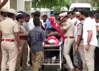 Body of the girl who was brutally assaulted and murdered in Sulur on a stretcher surrounded by policemen