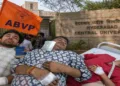 Injured ABVP karyakartas undergoing treatment following attack by SFI members at Hyderabad Central University.