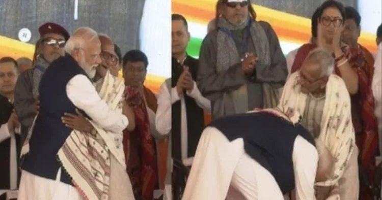 PM Modi touches feet of 98-year old Makhanlal Sarkar during West Bengal swearing-in ceremony