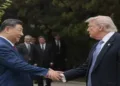 President Trump shakes hands with China's President Xi Jinping as he leaves after a visit to Zhongnanhai Garden in Beijing on May 15