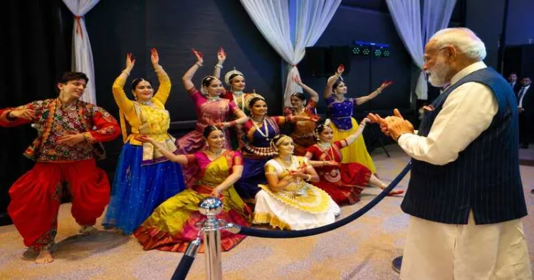Prime Minister Narendra Modi watches cultural performances by members of the Indian diaspora in the Netherlands during a community reception showcasing India’s classical and folk dance traditions