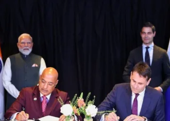 Tata Electronics CEO Randhir Thakur and ASML CEO Christophe Fouquet sign a MoU as PM Modi and Dutch PM Rob Jetten look on, during a two-day visit to the Netherlands in May 16, 2026