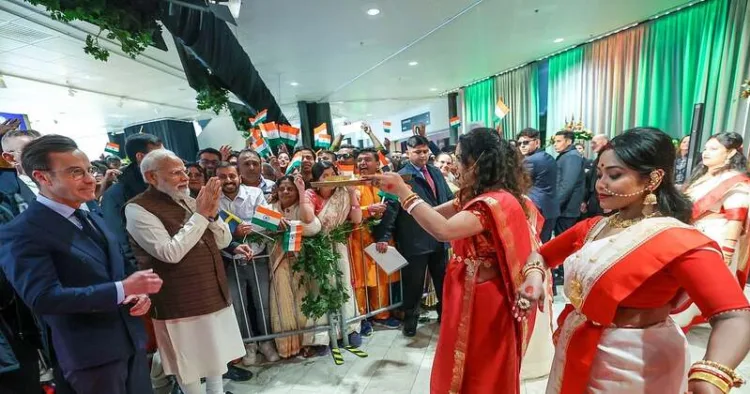 Prime Minister Narendra Modi receives a vibrant Bengali cultural welcome from the Indian diaspora during his arrival in Gothenburg, Sweden