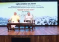 Sunil Ambekar addressing the gathering during the screening of the documentary Delhi Mein Sangh Yatra, organised by Indraprastha Vishwa Samvad Kendra in New Delhi on May 22, 2026