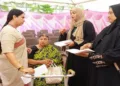 A political row erupted in Udupi after BJP leaders alleged that a woman shown as a Muslim neighbour helping a Hindu widow was actually her daughter who had converted to Islam