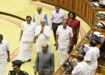 Governor enters the Assembly; State Police Chief seen behind him during the proceedings