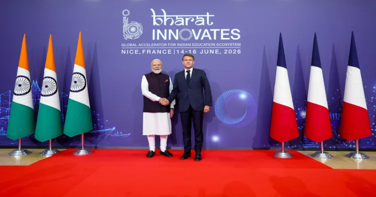 Nice [France], Jun 14 (ANI): Prime Minister Narendra Modi exchanges a handshake with French President Emmanuel Macron before the joint inauguration of the 'Bharat Innovates' event, in Nice on Sunday. (Narendra Modi Photo Gallery/ANI Photo)