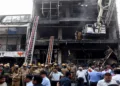Lucknow, Jun 22 (ANI): Firefighters conducting rescue and relief operations at a coaching centre in Aliganj area where a fire broke out, in Lucknow on Monday. Uttar Pradesh Deputy Chief Minister Brajesh Pathak also present. (ANI Photo)