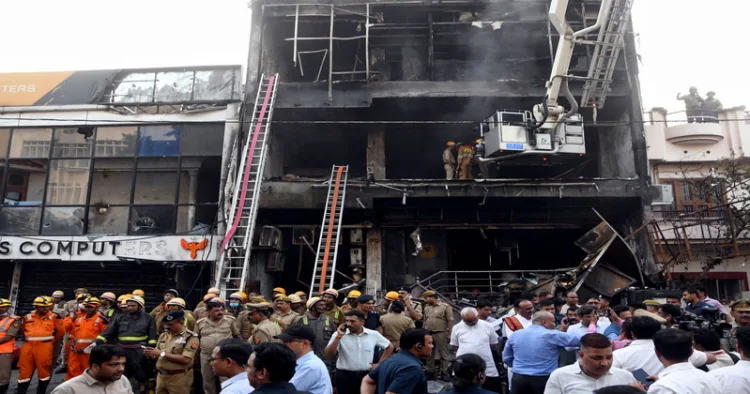 Lucknow, Jun 22 (ANI): Firefighters conducting rescue and relief operations at a coaching centre in Aliganj area where a fire broke out, in Lucknow on Monday. Uttar Pradesh Deputy Chief Minister Brajesh Pathak also present. (ANI Photo)