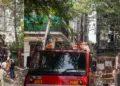 Fire-fighting officials at the site of the restaurant in Delhi Malviya Nagar