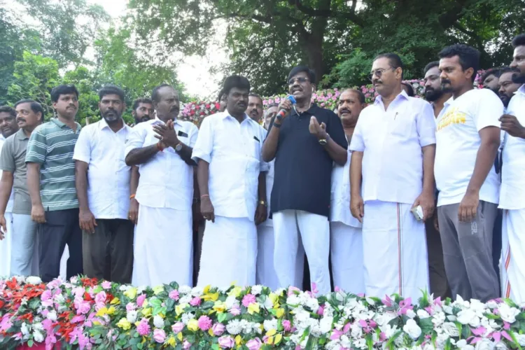 Tamil Nadu Higher Education Minister P. Viswanathan (Black T Shirt)