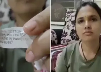 She showed the "Made in Pakistan" label attached to the bedsheet