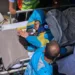 Everest Survivor being taken to the hospital on a stretcher