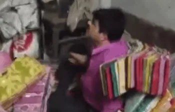 TMC leader Brahmananda Chakraborty arrested in Howrah after viral video shows him hiding under clothes, accused of cut money in PM Awas Yojana funds. (Image: X)