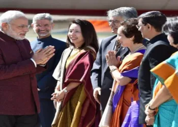 Prime Minister Narendra Modi during an overseas visit, greeting members of the Indian diplomatic and community delegation upon arrival. (File Photo)