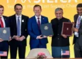 Union Minister Ashwini Vaishnaw, US Ambassador to India Sergio Gor, US Under Secretary of State Jacob Helberg, and officials at a ceremony in New Delhi as India formally joined Pax Silica in February 2026