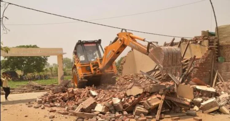 The Ghaziabad administration demolished an alleged illegal two-storey 'Mazar' on UPSIDA land in Loni, citing government land encroachment