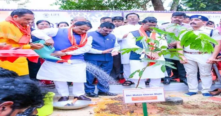 Odisha Chief Minister Mohan Charan Majhi and othets at the 77th State-Level Van Mahotsav celebration at Kapileswar Government High School in Bhubaneswar
