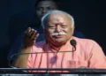 Nagpur, Jul 03 (ANI): Rashtriya Swayamsevak Sangh (RSS) chief Mohan Bhagwat speaks during the conclusion of a series of 100 videos based on the lives of Sangh pracharaks and the release of the 101st episode of the audio-visual series "Asu Ame Sukhane, Patthar Payaatil" to mark the centenary of the Rashtriya Swayamsevak Sangh, in Nagpur on Friday. (ANI Photo)