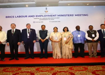 Union Minister Dr. Mandaviya with the dignitaries on the stage at the BRICS Trade Union Forum Summit