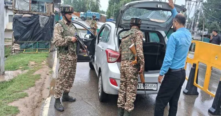 Security forces checking the vehicles as they intensify crackdown on terror networks in J&K