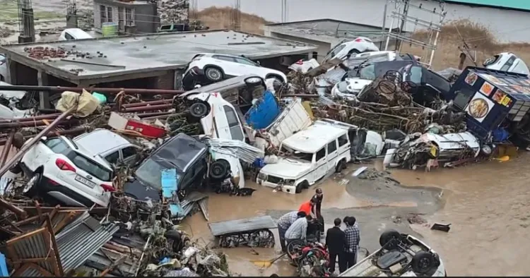 Vehicles washed away in J&K, due to torrential rain