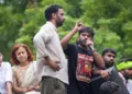 Cockroach Janata Party (CJP) founder Abhijeet Dipke speaks following a protest