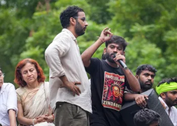 Cockroach Janata Party (CJP) founder Abhijeet Dipke speaks following a protest