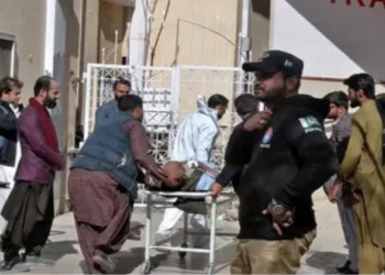 Injured being carried on a stretcher
