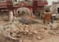 Security forces secure the site after a suicide attack in in Tank district